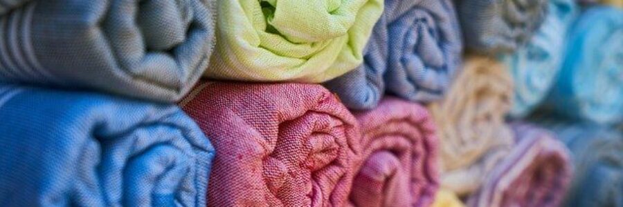 Colorful rolls of fabric - fabrics for skin conditions